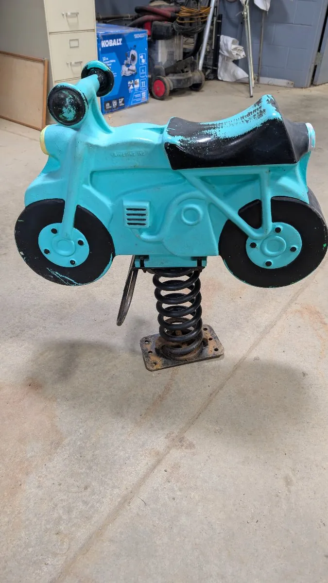 Saddle Mates motorcycle spring toy